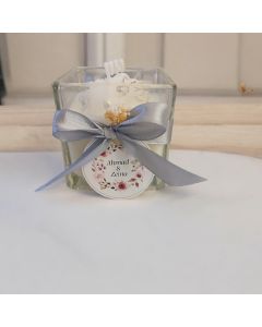 Elegant Glass Cup Candle with Delicate Floral Decorations